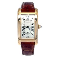 Pre-Owned Cartier Tank Americaine Automatic Watch Crafted in 18 Karat Rose Gold. Model W2620030. Silver Guilloche Dial with Date Function. Brown Gator Strap with 18 Karat Rose Gold Tang Buckle. Additional Strap Included. $15,685 MSRP. Elegant Yellow Gold Watch With Date Display, Elegant Brown Rectangular Watch, Elegant Brown Rectangular Watches, Classic Rose Gold Watch With Date Display, Luxury Brown Watches For Anniversary, Brown Anniversary Watches With Diamond Hour Markers, Rose Gold Analog Watch For Formal Occasions, Luxury Rose Gold Watches For Wedding, Elegant Anniversary Jewelry And Watches With Date Display