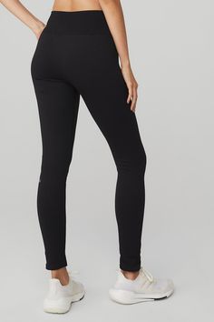 Seamless High-Waist Ribbed Legging - Black | Alo Yoga Stretch Alo Yoga Pants, Alo Yoga Stretch Leggings For Pilates, Alo Yoga Leggings For Pilates, Alo Yoga Fitted Leggings For Pilates, Alo Yoga Full-length Stretch Leggings, Black Compression Leggings By Alo Yoga, Alo Yoga Compression Leggings, Alo Yoga Tight Sporty Leggings, Black Compressive Alo Yoga Leggings