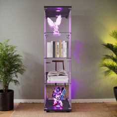 a purple shelf with books and plants in it