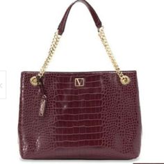 Victoria's Secret The Victoria Shoulder Tote Hand Bag Purse Burgundy Croc - Brand New With Tag, See Our Photos, Offers Welcome! In An Exotic Croc-Embossed Finish, Our Signature V Monogram Hardware And A Jewelry-Like Chain Strap. Main Pocket Fits: Phone, Wallet, Keys, A Small Laptop And Everyday Essentials Open Top With Snap Closure 1 Interior Zipper Pocket 13.4" L X 5.9" W X 10.2" H 9.4” Strap Drop Polyurethane Elegant Rectangular Victoria's Secret Bag, Elegant Everyday Victoria's Secret Shoulder Bag, Victoria's Secret Elegant Evening Bags, Elegant Victoria's Secret Shopping Bags, Elegant Victoria's Secret Shoulder Bag, Everyday Elegant Victoria's Secret Shoulder Bag, Elegant Victoria's Secret Bags For Daily Use, Victoria's Secret Elegant Rectangular Shoulder Bag, Elegant Victoria's Secret Shoulder Bag For Everyday