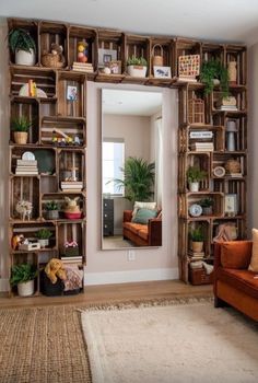 a living room filled with lots of wooden shelves and plants on top of each shelf