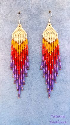 Orange Handwoven Dangle Beaded Earrings, Multicolor Handwoven Tassel Earrings Gift, Multicolor Handwoven Drop Tassel Earrings, Multicolor Handwoven Tassel Drop Earrings, Handwoven Multicolor Tassel Earrings Gift, Orange Handwoven Beaded Earrings, Orange Tassel Jewelry With Round Beads, Beaded Fringe Earrings, Red Violet