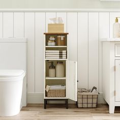 the bathroom is clean and ready to be used as a storage area for toiletries