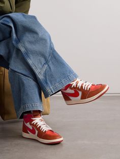 Nike's 'Method of Make' line takes iconic sneakers and elevates them with luxurious materials and details. Part of the series, this 'Air Jordan 1' pair is made from layered panels of leather and twill in a vibrant orange colorway. Show off the high-top profile with shorts or cropped pants. People Wearing Jordans, Jordan 1 High Electro Orange, Modern Nike Custom Mid-top Sneakers, Modern Nike Mid-top Custom Sneakers, Nike Modern Mid-top Custom Sneakers, Streetwear High-top Lace-up Sneakers With Contrasting Heel, Modern Leather High-top Sneakers With Red Sole, Designer Nike High-top Sneakers, Nike Modern High-top Sneakers