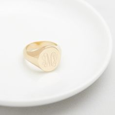 Available in 14k gold plated base metal Size: 5/8" by 1/2" Made in the USA With engraving this item is FINAL SALE SKU: BYR1020 Engraved Initial Ring For Everyday, Classic Everyday Personalized Signet Ring, Classic Rings With Engraving Option, Classic Rings With Engraving Option For Everyday, Elegant Everyday Signet Ring With Engraving Option, Oval Engraved Ring With Engraving Option, Everyday Oval Engraved Ring With Engraving Option, Everyday Engraved Dome Ring, Classic Adjustable Engraved Ring Tarnish Resistant