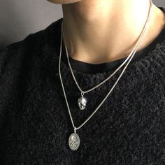 Our pendant was designed to follow our signet ring which is based on a Renaissance Memento Mori from 1600. Memento Mori jewelry has been worn for hundreds of years as a way to remember loved ones who have passed on. Worn on a sterling silver round box chain at 18" long with a 2" extension. All orders over $50 ship for free within the USA. All orders usually ship within 24 hours from the USA. Spiritual Silver Jewelry With Coin Pendant, Spiritual Sterling Silver Coin Pendant Jewelry, Sterling Silver Spiritual Coin Pendant Jewelry, Elegant Silver Jewelry For Commemoration, Symbolic Sterling Silver Coin Pendant Jewelry, Elegant Sterling Silver Jewelry For Commemoration, Symbolic Sterling Silver Jewelry For Commemoration, Silver Jewelry With Oval Coin Pendant, Symbolic Medallion Jewelry For Memorial