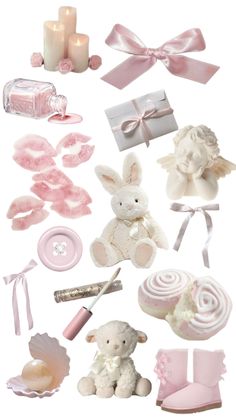 a collection of pink and white items including candles, teddy bear, baby booties, candle holders