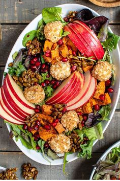 an apple and walnut salad with cranberries on top is shown in this image