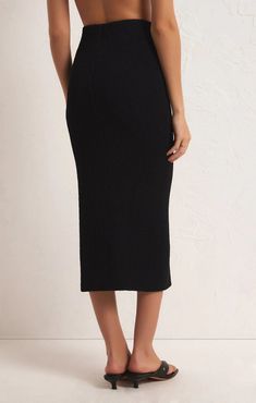 Sleek and sultry, this midi will become your fave go-to, from interviews to nights out. The hidden elastic waistband makes this skirt easy to pull on and the mid-weight knit is made for everyday wear. Fitted Crinkle Stretch Knit: 97% Nylon, 3% Elastane Elasticated waistband Fitted length Textured knit fabric Hand Wash Cold, Lay Flat to Dry, Low Iron on Reverse Side or Dry Clean Fitted Midi Skirt, Knit Pencil Skirt, Knit Midi Skirt, Black Midi Skirt, Knit Midi, Fitted Skirt, Textured Knit, Knee Length Skirt, Scarf Hairstyles