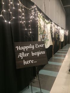 there is a sign that says happily ever after begins here