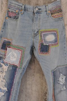 "Ready to send : Size 34 ,33,32,31 Unique vintage jeans with apcycled patches. One of a kind.. Hand made embroidery and unique painting .... ---Or---- Made to order, in any size, within 7 working days . If you need different size, please send me a message and I will make you a special and unique design within 2 working days. They are all different! No one will have the same one as you have! Hand painted, one of kind jeans. You pick your size, model (slime- boyfriend- high waist- low waist) and p Trendy Distressed Multicolor Jeans, Multicolor Patchwork Jeans For Festival, Multicolor Distressed Cotton Jeans, Blue Distressed Bohemian Jeans, Bohemian Distressed Blue Jeans, Bohemian Blue Distressed Jeans, Festival Patchwork Denim Jeans, Multicolor Distressed Denim Jeans, Bohemian Jeans In Denim Blue Recycled Denim