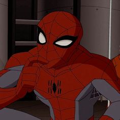 spider - man from the animated series is sitting in front of a door with his hands on his hips