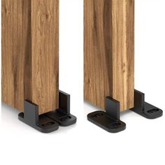 two wooden speakers with black stands on white background