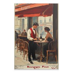 a man and woman sitting at a table in front of a bar with red awnings