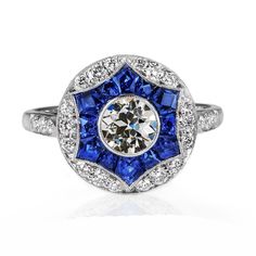 a blue and white diamond ring