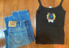 90's Lit Tank Top This shirt with a classic pair of Docs. Heck yes Graphic is perfect condition Straps are slightly faded Tag - Gaziani Size - Small Pit to pit - 14 inches Length - 21 inches Ways To Get Money, Graphic Tank Tops, Foo Fighters, Levi Strauss, Graphic Tank, Womens Tank, Cargo Shorts, Womens Clothing Tops, Tank Top