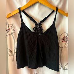 American Eagle Black Crop Top / Bralette With Embroidered Back . Adjustable Straps. Never Worn Black Lace Camisole For Summer, Black Tops With Built-in Bra For Vacation, Black Lace Tank Top For Summer, Black Lace Crop Top For Summer, Black Lace Trim Crop Top For Summer, Summer Black Crop Top With Lace Trim, Black Vacation Tops With Built-in Bra, American Eagle Black Jeans, American Eagle Coquette