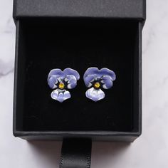 The violet earrings set is an amazing unique pieces. It has color and vibrance. This item is perfect for any occasion, spring, summer, fall, you could wear it through all. Pansies are often associated with thoughtfulness, remembrance, and affection, which may make them a popular gift item for special occasions or as a way to express gratitude. Thinking about that perfect gift for your special someone? Look no further then these beautiful pansies.  Jewelry Care  ☀️- Store your jewelry in a clean, dry space 👝- Please keep it in a zip bag 🍵- Avoid contact with chemicals and lotion 🛀- Remove before showering, swimming, and sleeping 💍All jewelry is made from antiallergenic materials if there happens to be a reaction you can contact us in the messages. Safe jewelry is our utmost priority 👀 Blue Flower Earrings For Mother's Day, Mother's Day Blue Flower Earrings, Violet Earrings, Purple Pansy, Cute Spring, Pretty Gift, Perfect Gift For Her, Dream Jewelry, Pansies