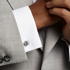 A classic motif emblematic of an unbreakable bond is reimagined by Graff in the Love Knot cufflinks. Featuring a polished double knot, skillfully crafted by our master artisans in 18 carat white gold, add symbolism and style to your tailoring with these exquisitely crafted cufflinks. Also available in rose gold, the Love Knot cufflinks are fastened with a classic whale-back closure. Elegant Love Knot cufflinks in 18 carat white gold. White Gold Sterling Silver Cufflinks For Business, Formal White Gold Sterling Silver Cufflinks, Elegant White Gold Cufflinks For Anniversary, Elegant White Gold Cufflinks As Gift, Luxury Sterling Silver Business Jewelry, Luxury Sterling Silver Jewelry For Business, Formal Classic Platinum Jewelry, Refined Classic Jewelry For Formal Occasions, Refined Classic Design Jewelry For Formal Occasions