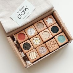 an open box with different shapes and colors