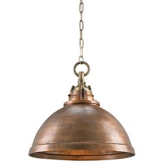 an antique style pendant light hanging from a chain