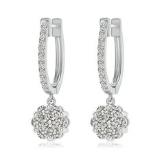 The cluster of pressure-set round diamonds, linked to diamond-studded hinged hoops, dazzles breathtakingly. This alluring pair of drop earrings is crafted in platinum. Diamond Jewelry Earrings, Hoop Drop Earrings, White Diamond Earrings, Fine Jewellery Earrings, Diamond Cluster, Round Earrings, Diamond Studs, White Diamond, Diamond White