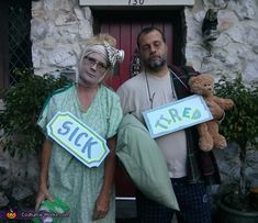 two people dressed in costumes holding signs that say sick and tired, standing next to each other