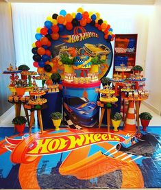 a hot wheels birthday party with balloons and decorations