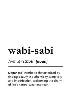 the words wabi - sabi are written in black and white, with an image of