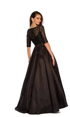 Long black a-line ball gown with sheer long sleeve bodice.