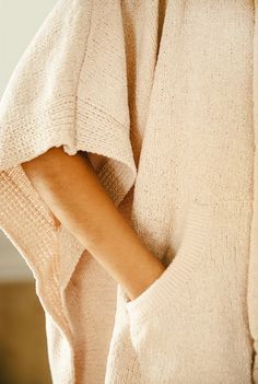 The comfiest and coziest knit poncho for loungewear and travel...soft as a blanket! Delicate but durable, this wardrobe staple will be your go-to piece year after year. Color: blush. ONE SIZE fits most. 80% Polyester, 20% Nylon Machine wash gentle cycle. Do not bleach. Tumble dry low or lay flat to dry. Cozy Soft Knit Outerwear For Loungewear, Cozy Sweater For Winter Relaxation, Cozy Winter Sweater For Relaxation, Cozy Solid Color Cardigan For Loungewear, Oversized Super Soft Comfortable Sweater, Comfortable Oversized Beige Sweater, Oversized Comfortable Beige Sweater, Cozy Soft Knit Sweater For Loungewear, Cozy Sweater For Loungewear