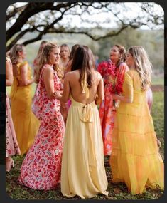 a group of women standing next to each other