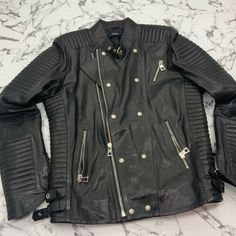 Material: 100% Genuine Leather Luxury Black Biker Jacket For Biker Events, Luxury Black Biker Jacket For Events, Luxury Black Biker Jacket, Luxury Long Sleeve Biker Jacket For Biker Events, Luxury Winter Outerwear For Biker Events, Luxury Fitted Silver Outerwear, Luxury Silver Outerwear For Winter, Luxury Black Leather Biker Jacket, Designer Black Leather Jacket For Streetwear