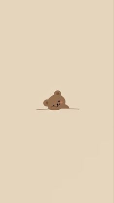 a brown teddy bear floating in the air