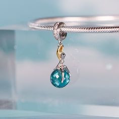 This is charm only, bracelet is sold separately. These beautiful dangle fairy charm for bracelet features a cute pixie elf fairy sit on a blue glass CZ stone with diamond cut texture. The dangle fairy charm will fit Pandora bracelet or you can pick out our 925 sterling silver bracelet for charm. Add this fairy dangle charm to your existing bracelet or as gift for your love one. Dimensions: L1.18 x W0.35 in (30x 9.1mm)Hole diameter: 0.18 in (4.7mm) Jewelry Care: See more information about how to Silver Charms Jewelry For May Birthstone, Silver Jewelry With Charms For May Birthstone, Silver Jewelry With May Birthstone Charms, Sterling Silver Round Pendant Charms With Gemstone, Sterling Silver Birthstone Pendant Charms, Silver Dangle Moon Charm, Elegant Silver Moon Charm, Elegant Sterling Silver Moon Charm, Sterling Silver Gemstone Charms