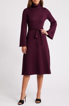 Wide ribbing adds soft texture to this elegant sweater-dress knit with a foldover turtleneck and tethered at the waist by a matching sash. 44" length Turtleneck Long sleeves Removable sash Unlined 78% rayon, 22% polyester Machine wash, dry flat Imported Chic Burgundy Midi Dress For Fall, Chic Burgundy Midi Dress For Winter, Winter Burgundy Midi Dress Knee-length, Winter Burgundy Midi Knee-length Dress, Burgundy Midi Dress For Winter, Midi Sweater Dress, Elegant Sweater, Dress Knit, Turtleneck Long Sleeve