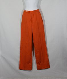 "Here's a pair of rare vintage original J.G. Hook label flared wide leg orange pants! These are sweet 70's trousers that have a flattering high rise and high waist fit. These vintage slacks are in a brilliant, stand out orange color and they have a zipper fly, flat front and a really great long and wide leg cut. Sweet pants! They are in great pre-owned vintage condition with usual/more minor signs of wear and they are as-found because they have been nicely altered at the leg hem. Check out the p Retro Cotton Wide Leg Pants With Pockets, Retro Fitted Solid Color Bottoms, Retro Wide Leg Cotton Pants With Pockets, 70s Inspired Cotton Wide Leg Pants, Retro Wide-leg Pants With Pockets, 70s Inspired Wide Leg Cotton Pants, Vintage Full Length Bottoms For Spring, Retro Solid Color Bottoms For Spring, Retro Spring Bottoms