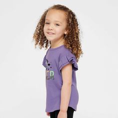 Looking for a cute tee for your daughter? We have the perfect flutter sleeve graphic tee. Playful Purple Short Sleeve T-shirt, Fun Short Sleeve Purple Tops, Fun Purple Short Sleeve Tops, Playful Purple Cotton Tops, Playful Purple Short Sleeve Tops, Playful Cotton Top With Flutter Sleeves, Playful Cotton Tops With Flutter Sleeves, Big Sis, Top Graphic Tees