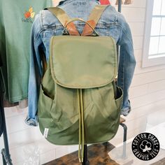 Introducing the Fall Olive Backpack - for the stylish girl on the go! Made of beautiful, easy-care nylon material, this minimalist design is perfect for carrying all your essentials without straining your shoulders or back. With adjustable canvas straps, side pocket, and secure closures, it's both practical and chic.🌻 Trendy Nylon Backpack With Pockets, Casual Nylon Backpack For Summer, Casual Solid Color Backpack For Daily Use, Trendy Green Backpack For Everyday Use, Trendy Canvas Backpack With Pockets, Trendy Canvas Travel Backpack, Nylon Softback Backpack With Adjustable Straps, Trendy Green Travel Backpack, Casual Solid Backpack With Adjustable Strap