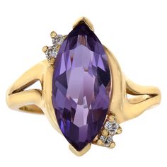 Amethyst Is A Meditative And Calming Stone Which Works In The Emotional And Physical Planes To Promote Calm And Peace. Simply Stunning, This Gemstone Ring Showcases An Elegant Marquise Cut 3.00 Carat Total Carat Weight (Size Of A Gemstone 14x7mm) Amethyst Gemstone And Diamond Accent 0.08 Carat Total Weight In A Prong Setting, Color/Clarity I,J-Si2. Set In 14k Yellow Gold, Ring Weighs 4.4 Grams, Width 16.3 Mm And Is Size 5.75. Free Re Sizing. Wcr3716 Formal Purple Diamond Ring With Gemstone Accents, Formal Amethyst Birthstone Ring With Gemstone Accents, Vvs Clarity Amethyst Ring, Formal Purple Amethyst Ring With Vvs Clarity, Formal Purple Amethyst Ring With Diamond Accents, Formal Purple Birthstone Ring With Prong Setting, Purple Marquise Jewelry For Formal Occasions, Purple Amethyst Gemstones With Diamond Accents, Formal Lavender Amethyst Ring