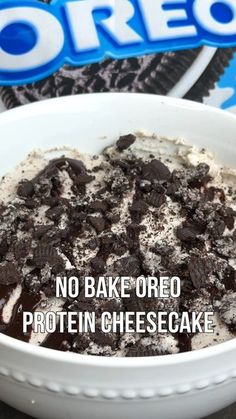 a bowl of oreo protein cheesecake with chocolate chips in it and the words oreo no bake oreo protein cheesecake