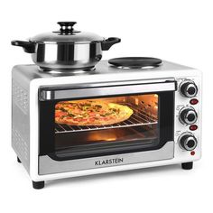 an oven with a pan on top of it and food cooking in the oven inside