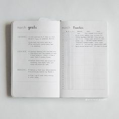 an open book with writing on it and the words march goals written in black ink