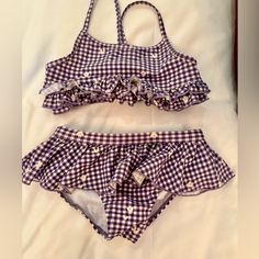 Adorable Ruffle Bikini In Purple Check. By Canadian Designer Souris Mini (Similar To Hanna Andersson). Never Worn. Size 8 But Runs A Tad Slim Fitted Summer Swimwear For Playtime, Fitted Beachwear Tankini For Playtime, Cute Summer Tankini For Playwear, Cute Spring Tankini For Playwear, Cute Summer Tankini For Casual Wear, Cute Fitted Tankini For Swimming, Cute Fitted Tankini For Beach Season, Cute Fitted Sleeveless Tankini, Purple Beachwear Swimwear