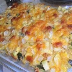 a casserole dish with chicken and vegetables in it