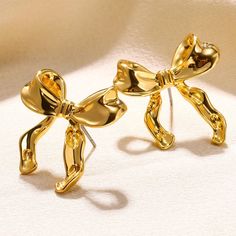 Product information: Treatment Process: Electroplating Color: gold, silver Material: Alloy Shape: Bow Packing list: A pair of earrings Product Image: Studded Nails, Color Earrings, Stil Elegant, Bow Earrings, Bow Design, Accessories Jewelry Earrings, Stainless Steel Earrings, Simple Earrings, Geometric Earrings