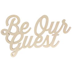 a wooden sign that says be our guest with the words'be our guest'in cursive font