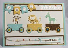 a birthday card with a train and animals on it