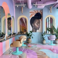 a room with chairs, mirrors and paintings on the walls that are painted in pastel colors