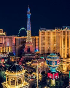 the eiffel tower is lit up at night in las vegas, nv